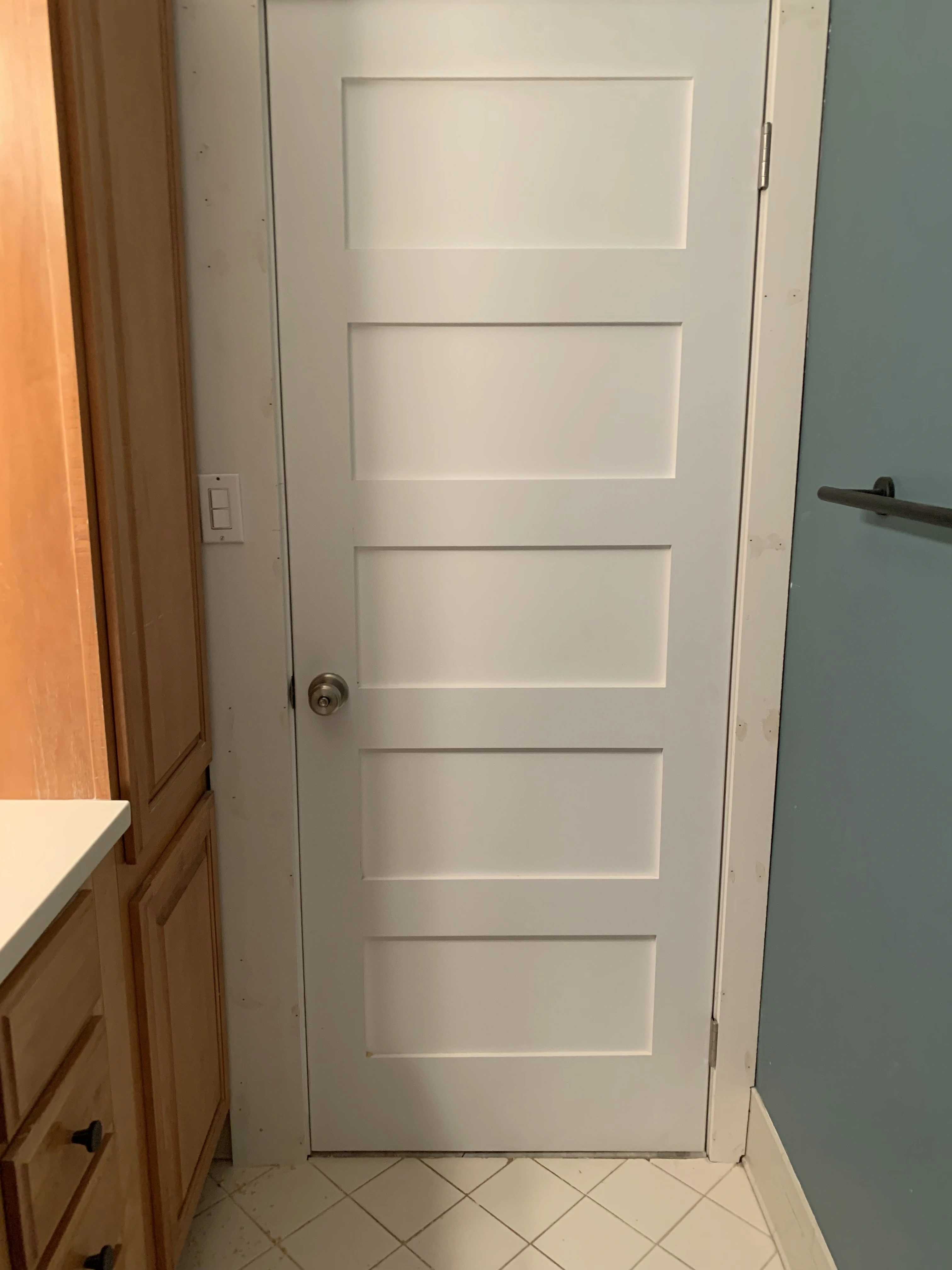 A newly installed door for a bathroom